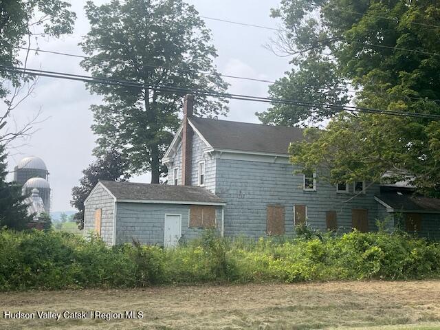 1820 Co Rte 7 Ancram, NY 12502 - Photo 13 of 32 a front view of a house with a garden