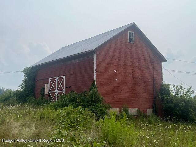 1820 Co Rte 7 Ancram, NY 12502 - Photo 18 of 32 a brick building with a yard