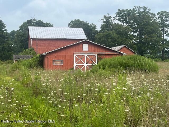 1820 Co Rte 7 Ancram, NY 12502 - Photo 22 of 32 a front view of a house with garden