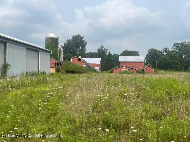 1820 Co Rte 7 Ancram, NY 12502 - Photo 30 of 32 a backyard of a house with table and chairs
