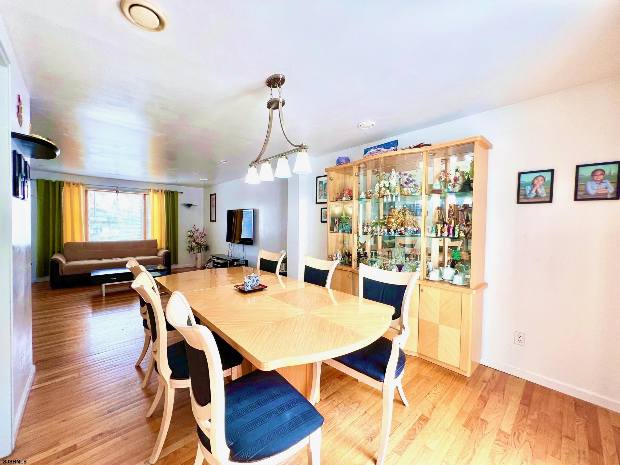 19 Walnut Lane Clementon, NJ 08021 - Photo 5 of 24 a view of a dining room with furniture and wooden floor