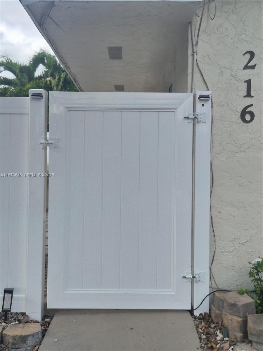 216 Southwest 9th Street, Unit 2 Hallandale Beach, FL 33009 - Photo 13 of 19 a bathroom with a shower