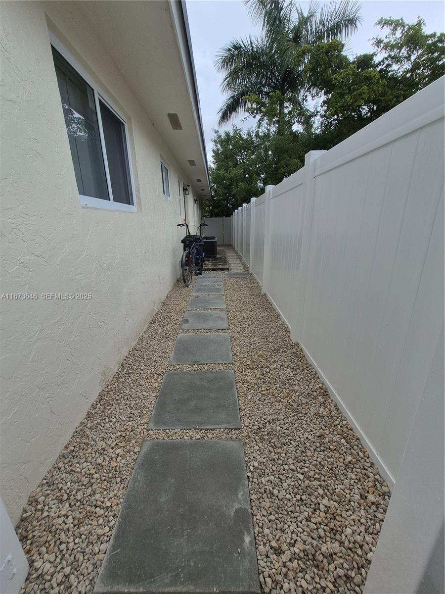216 Southwest 9th Street, Unit 2 Hallandale Beach, FL 33009 - Photo 19 of 19 a view of a backyard