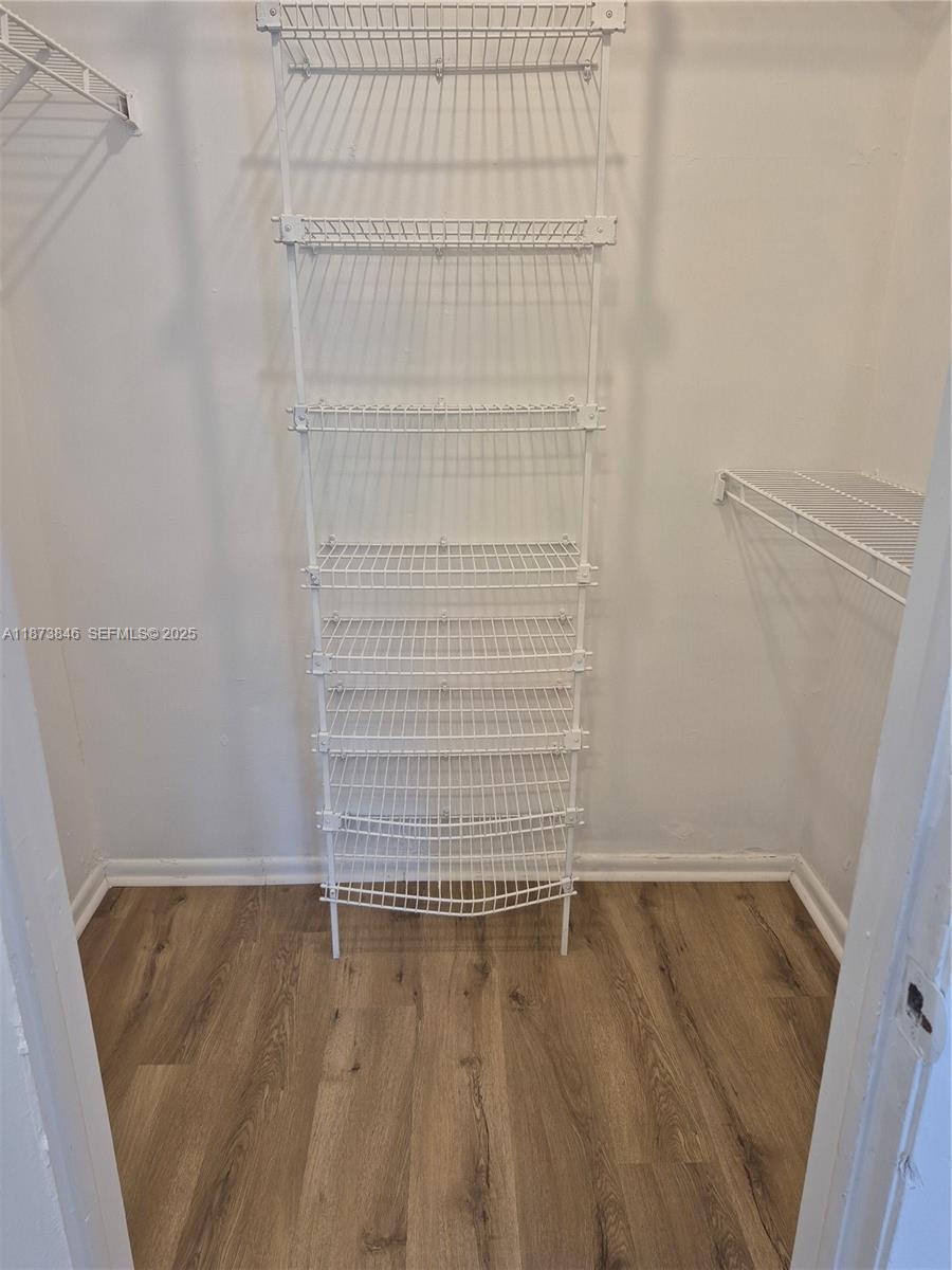 216 Southwest 9th Street, Unit 2 Hallandale Beach, FL 33009 - Photo 9 of 19 a view of outdoor space with wooden floor