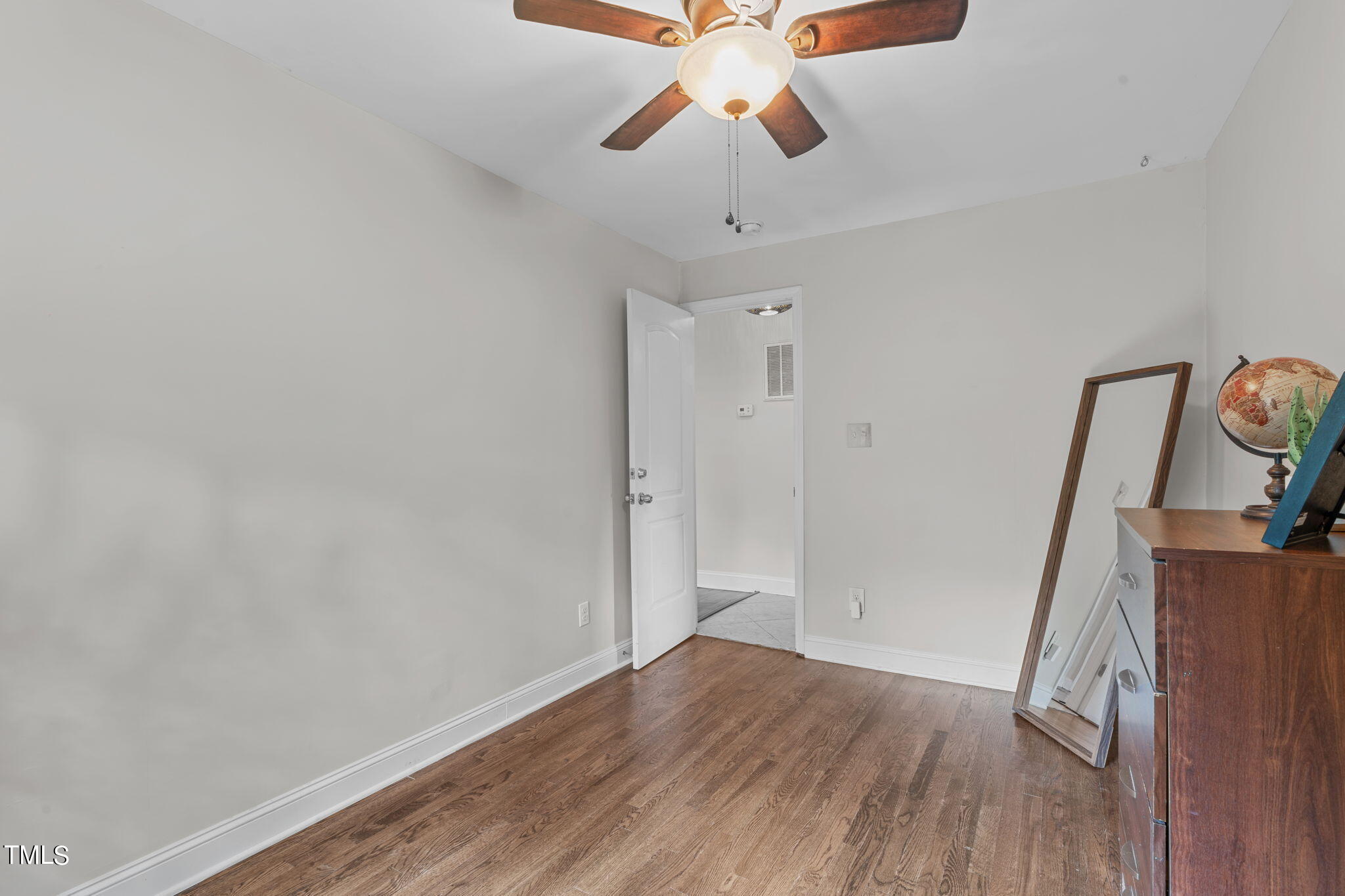515 Freeman Street Raleigh, NC 27601 - Photo 11 of 44 wooden floor in an empty room with a window