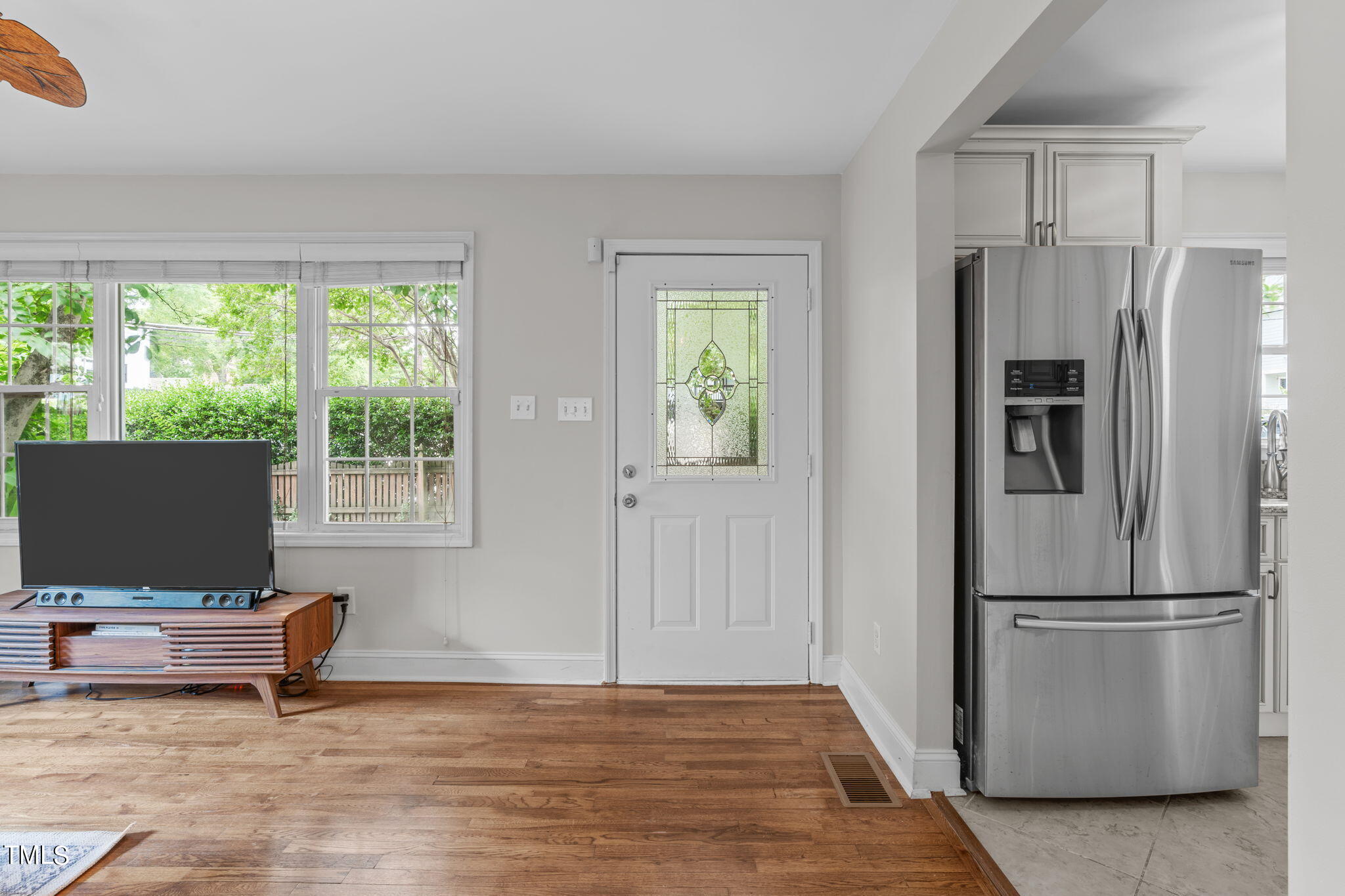 515 Freeman Street Raleigh, NC 27601 - Photo 12 of 44 a view of kitchen with furniture refrigerator and window