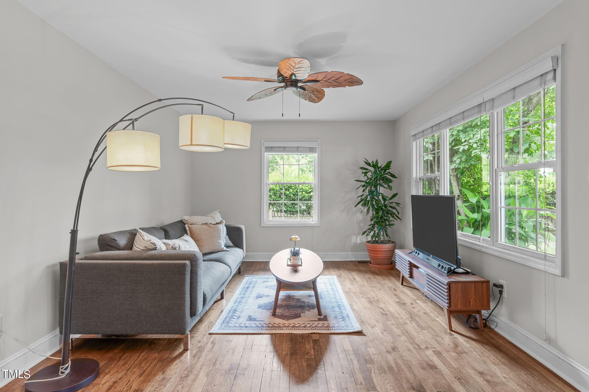 515 Freeman Street Raleigh, NC 27601 - Photo 13 of 44 a living room with furniture flowerpot and wooden floor