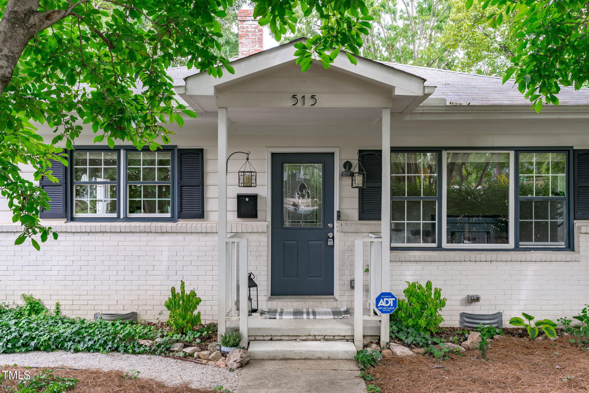 515 Freeman Street Raleigh, NC 27601 - Photo 3 of 44 front view of a house with a small yard