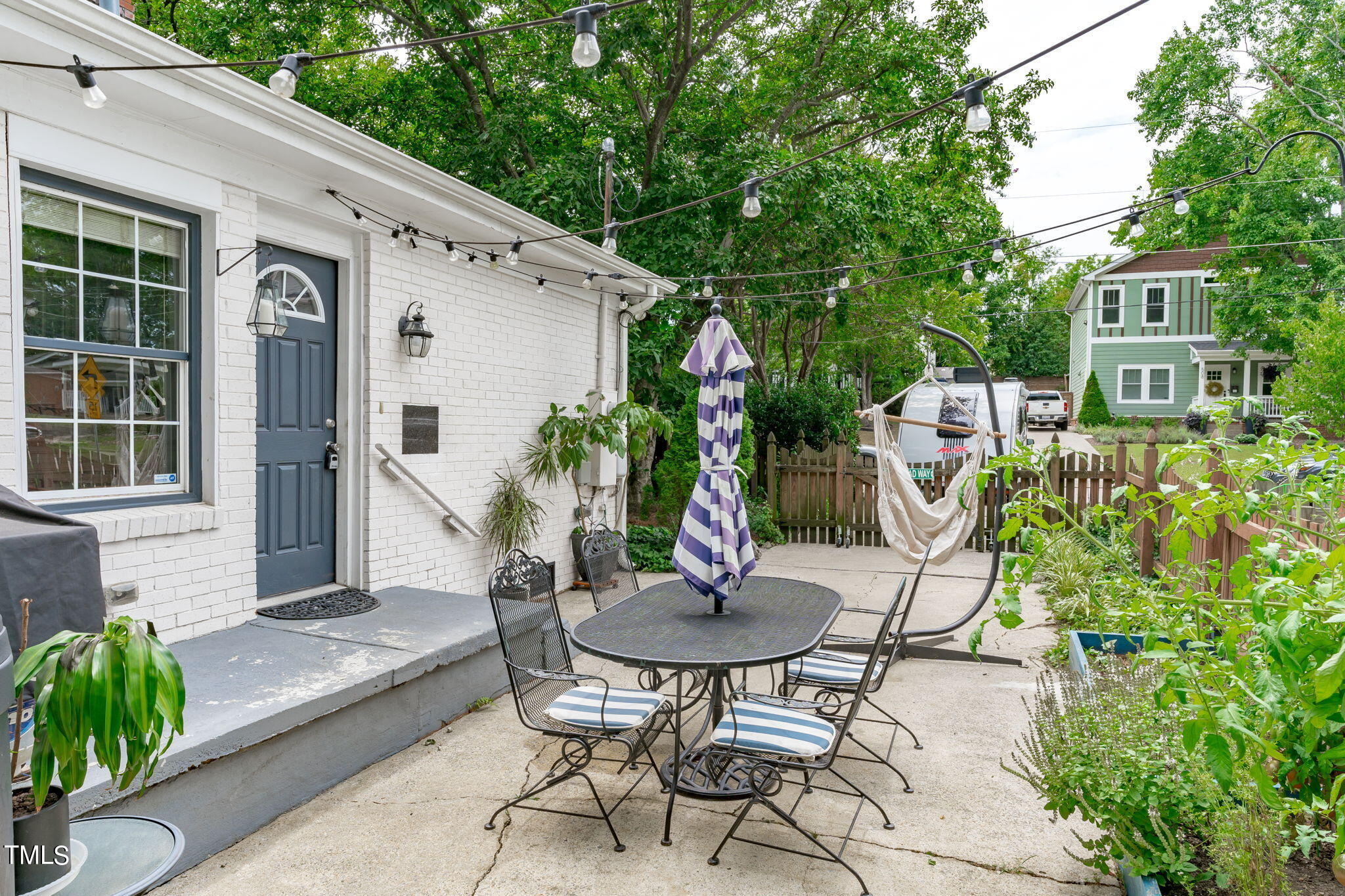 515 Freeman Street Raleigh, NC 27601 - Photo 31 of 44 a view of a chairs and table in backyard of the house