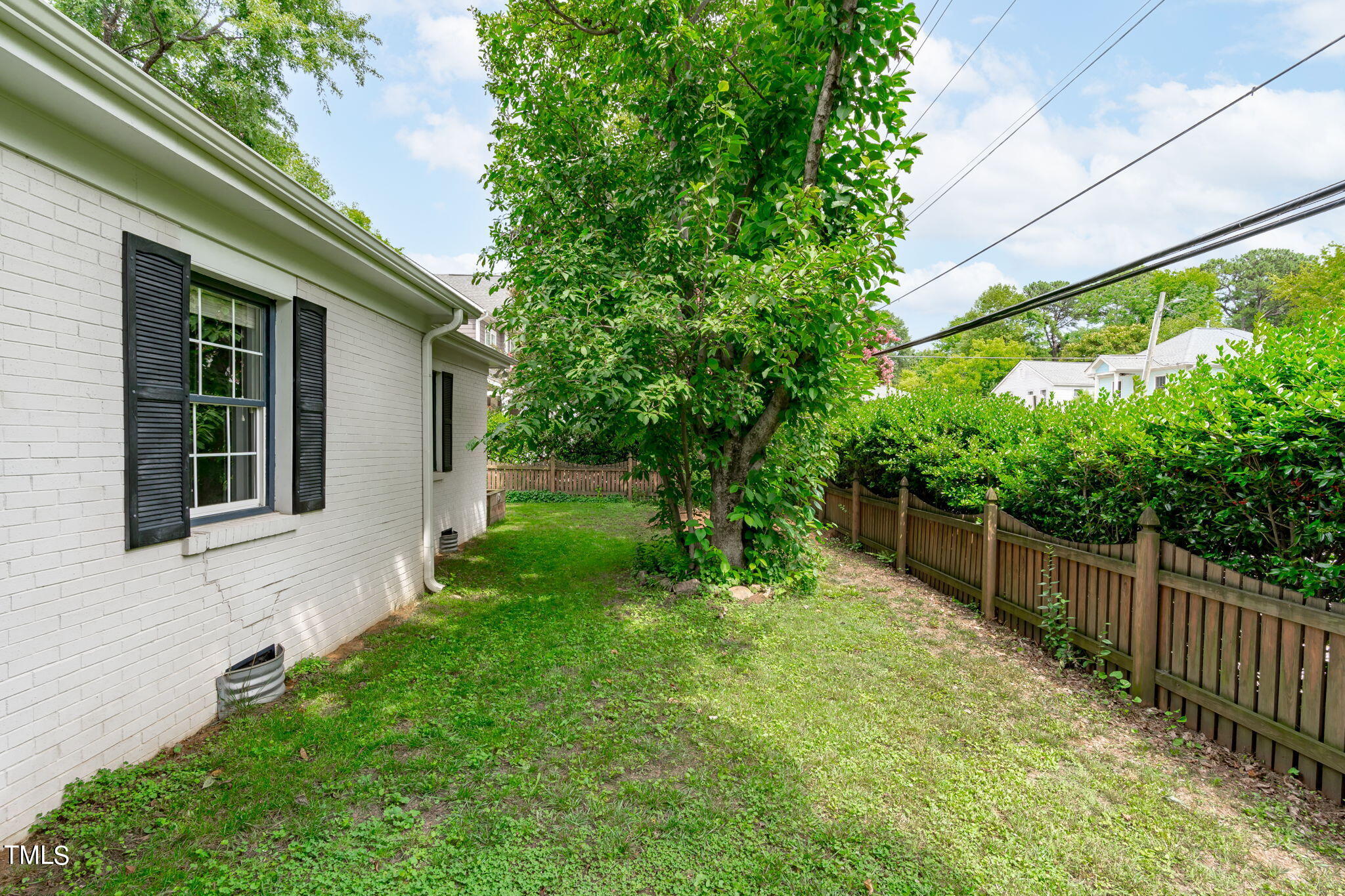 515 Freeman Street Raleigh, NC 27601 - Photo 35 of 44 a view of house with backyard