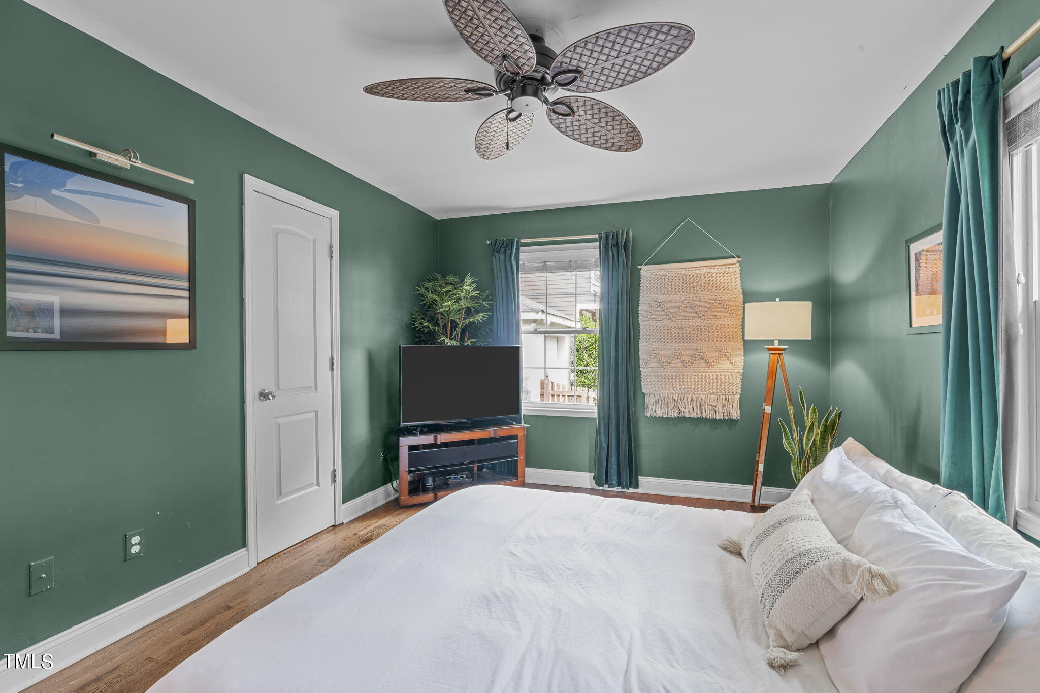 515 Freeman Street Raleigh, NC 27601 - Photo 7 of 44 a bedroom with furniture and a window