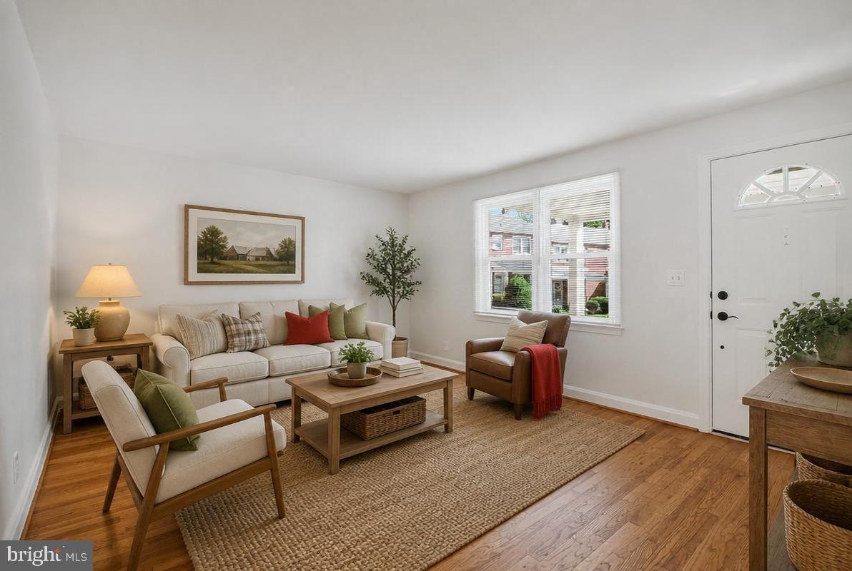 1016 Winsford Road Towson, MD 21204 - Photo 2 of 42 a living room with furniture and a window