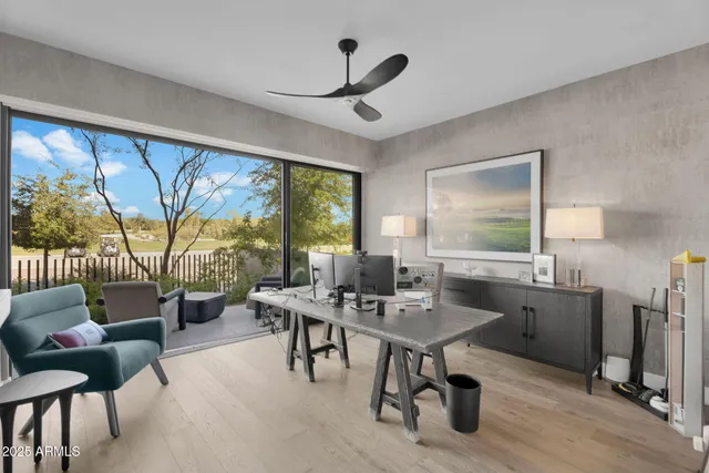 a workspace with furniture window and outside view