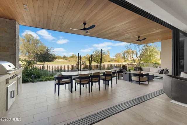a dining room with furniture and outdoor view