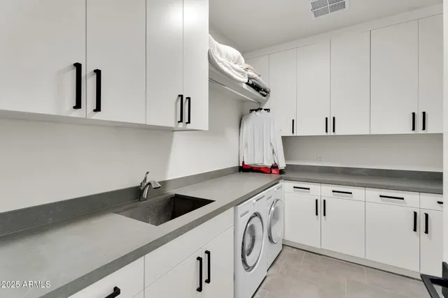 a view of a patio with couches table and chairs and potted plants
