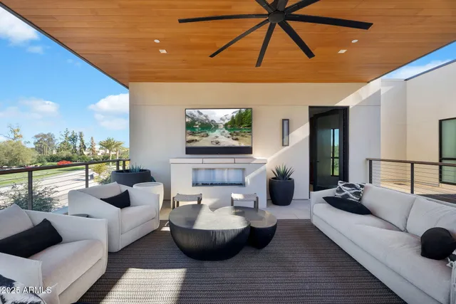 a view of living room with furniture and window