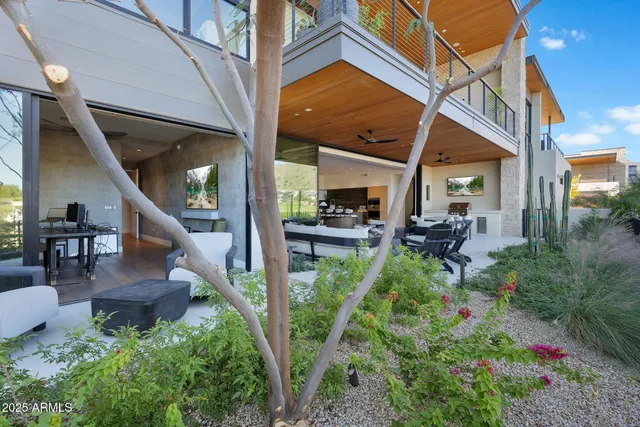 a view of a patio with couches table and chairs