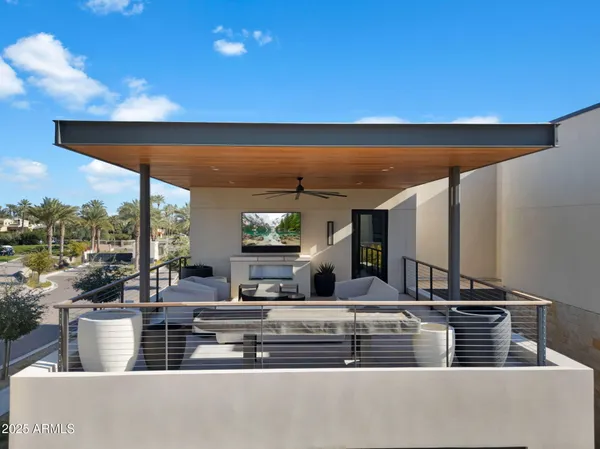 a view of a living room and kitchen