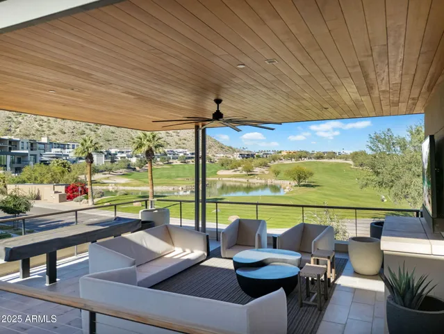 a view of living room kitchen and mountain