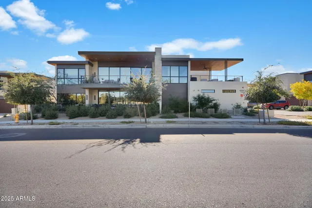 a view of a house with a street