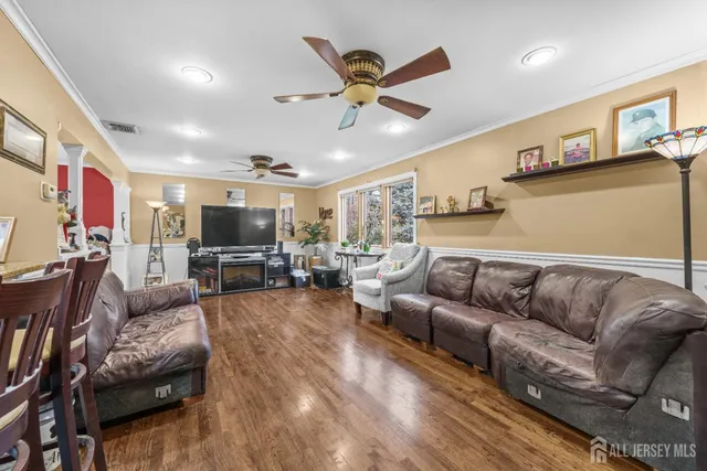 a living room with furniture and a table