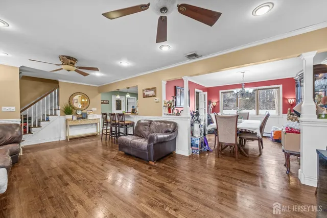 a bed room with a bed and a chandelier