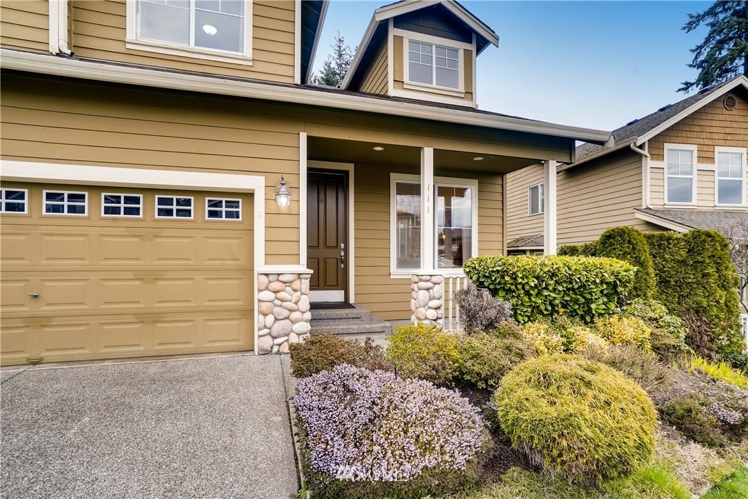 111 203rd Street Southeast Bothell, WA 98012 - Photo 3 of 31 a front view of a house