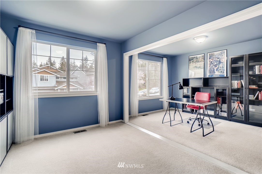 111 203rd Street Southeast Bothell, WA 98012 - Photo 23 of 31 a workspace with furniture window and outside view