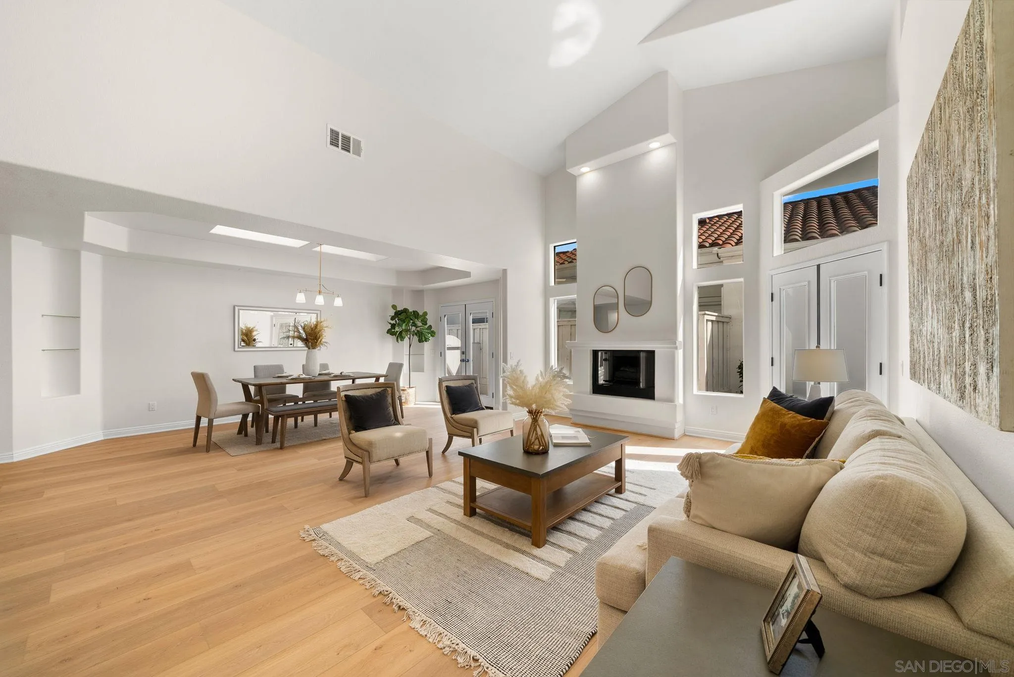 4957 Lamia Way Oceanside, CA 92056 - Photo 14 of 31 a living room with furniture and a fireplace