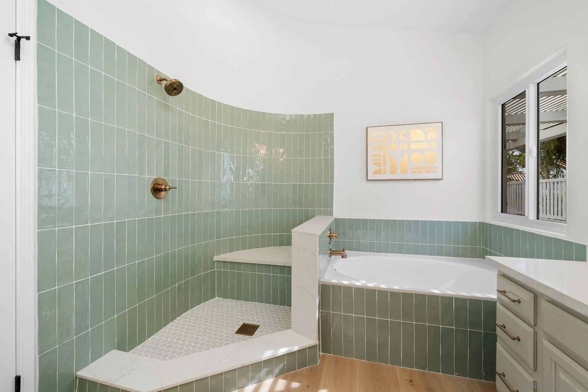 4957 Lamia Way Oceanside, CA 92056 - Photo 21 of 31 a bathroom with a shower and a sink