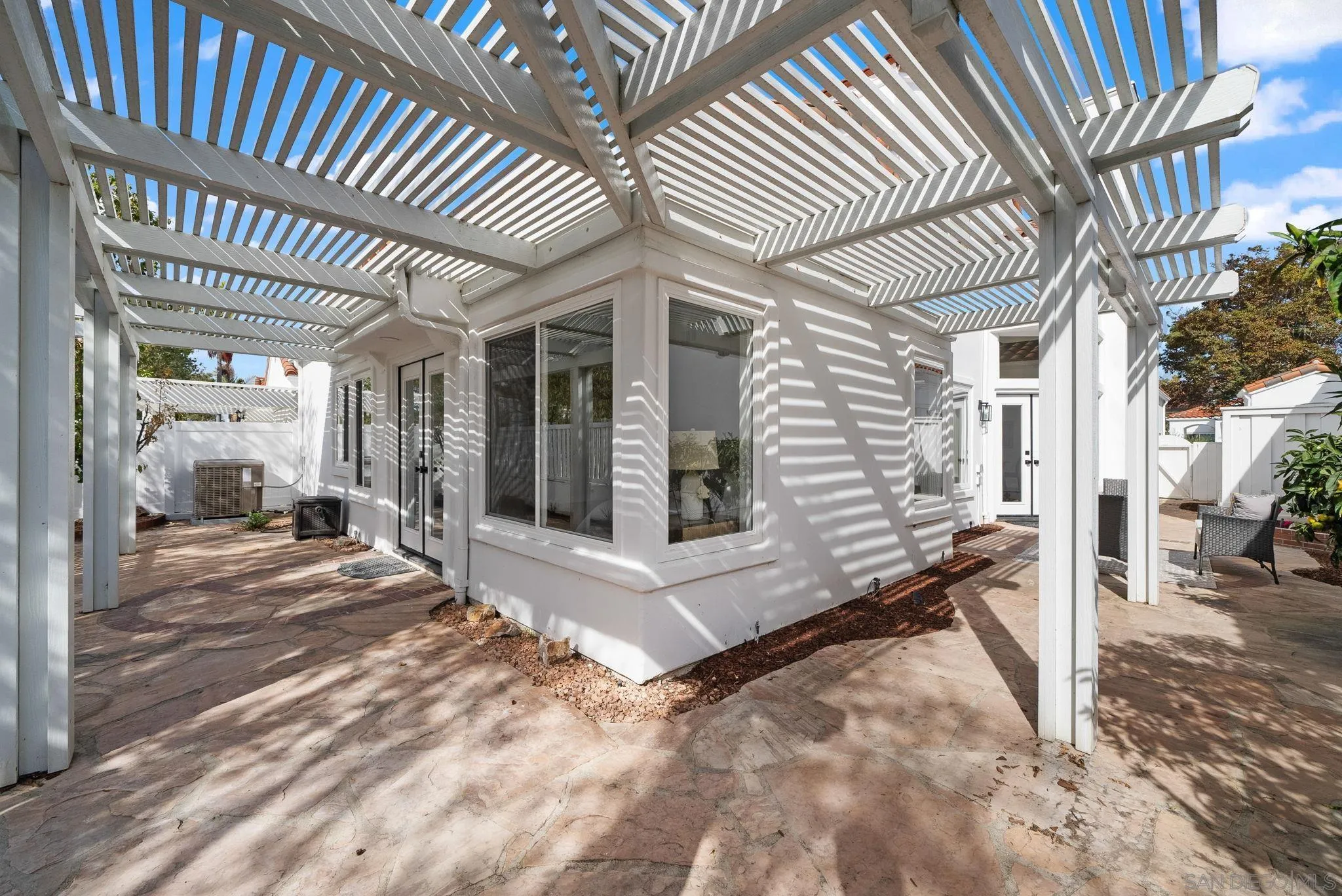4957 Lamia Way Oceanside, CA 92056 - Photo 29 of 31 a view of a patio with table and chairs