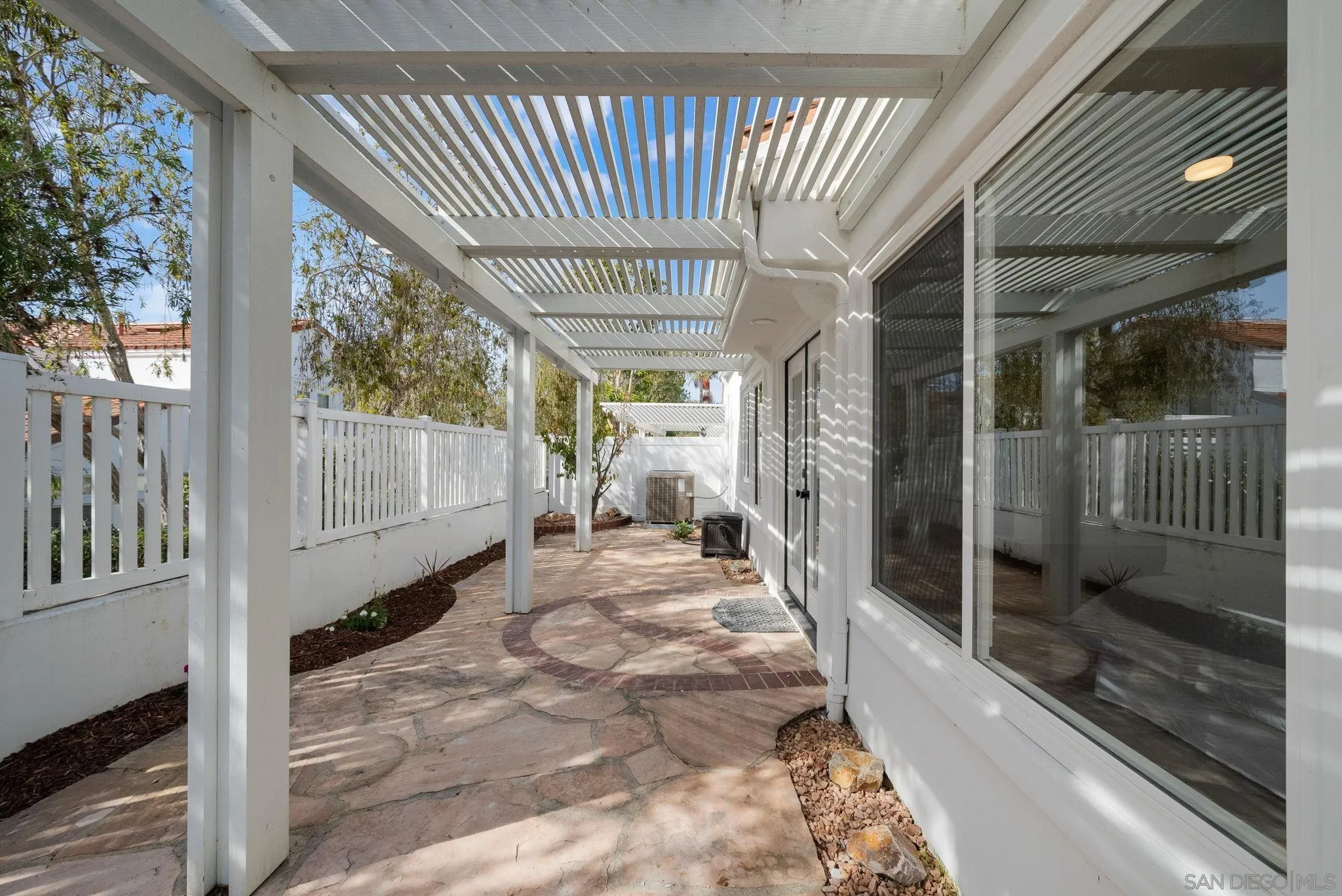 4957 Lamia Way Oceanside, CA 92056 - Photo 31 of 31 a view of a house with a porch