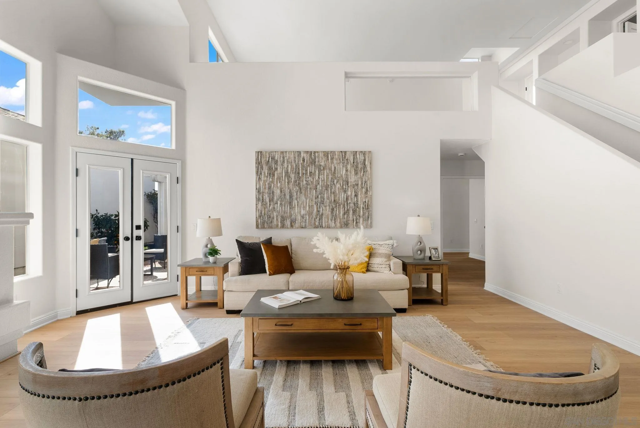 4957 Lamia Way Oceanside, CA 92056 - Photo 9 of 31 a living room with furniture and a potted plant