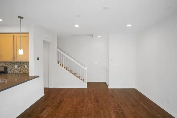 a view of entryway with wooden floor