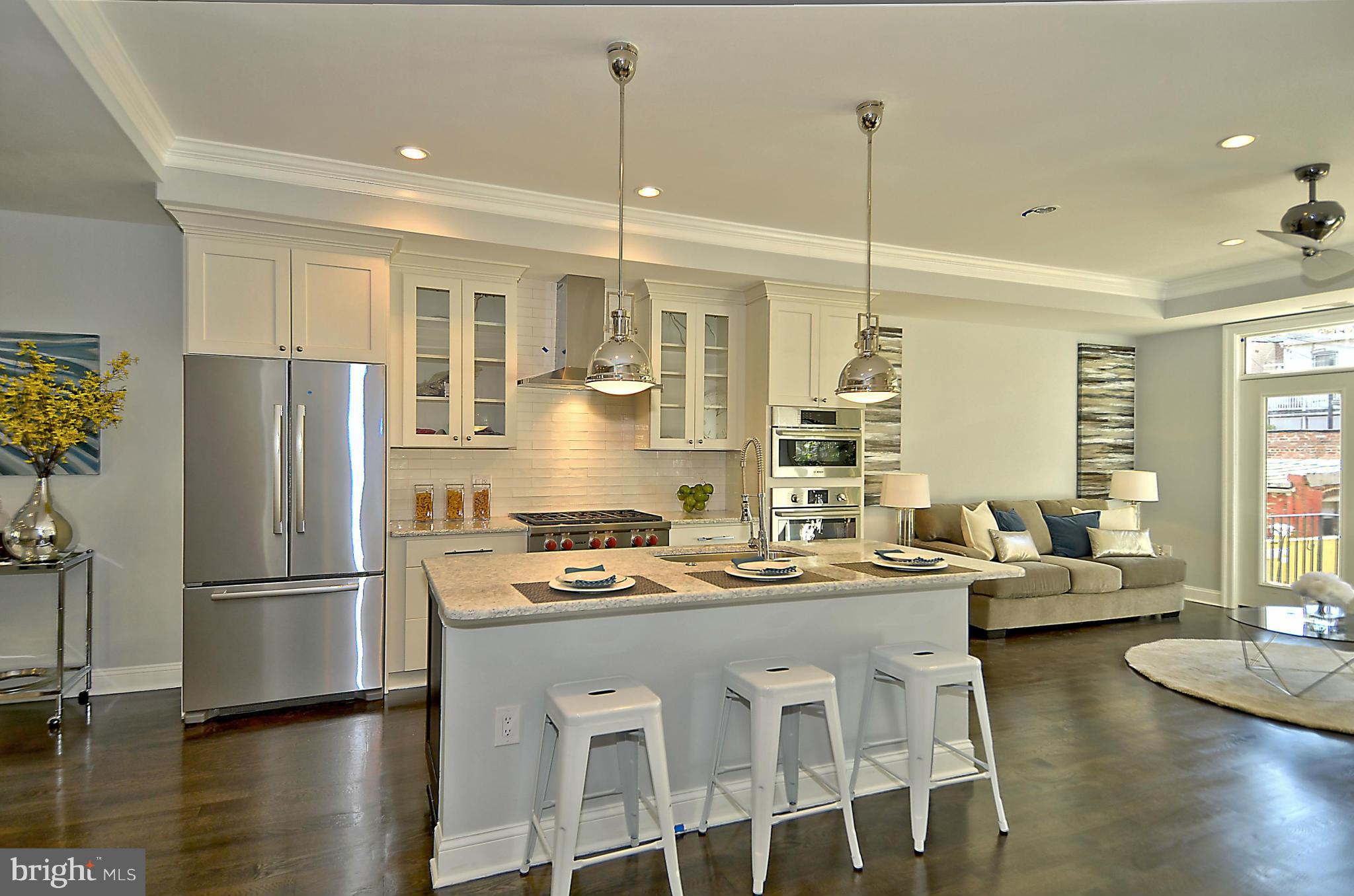 620 6th Street Northeast Washington, DC 20002 - Photo 3 of 30 Kitchen w/ Island and Pantry