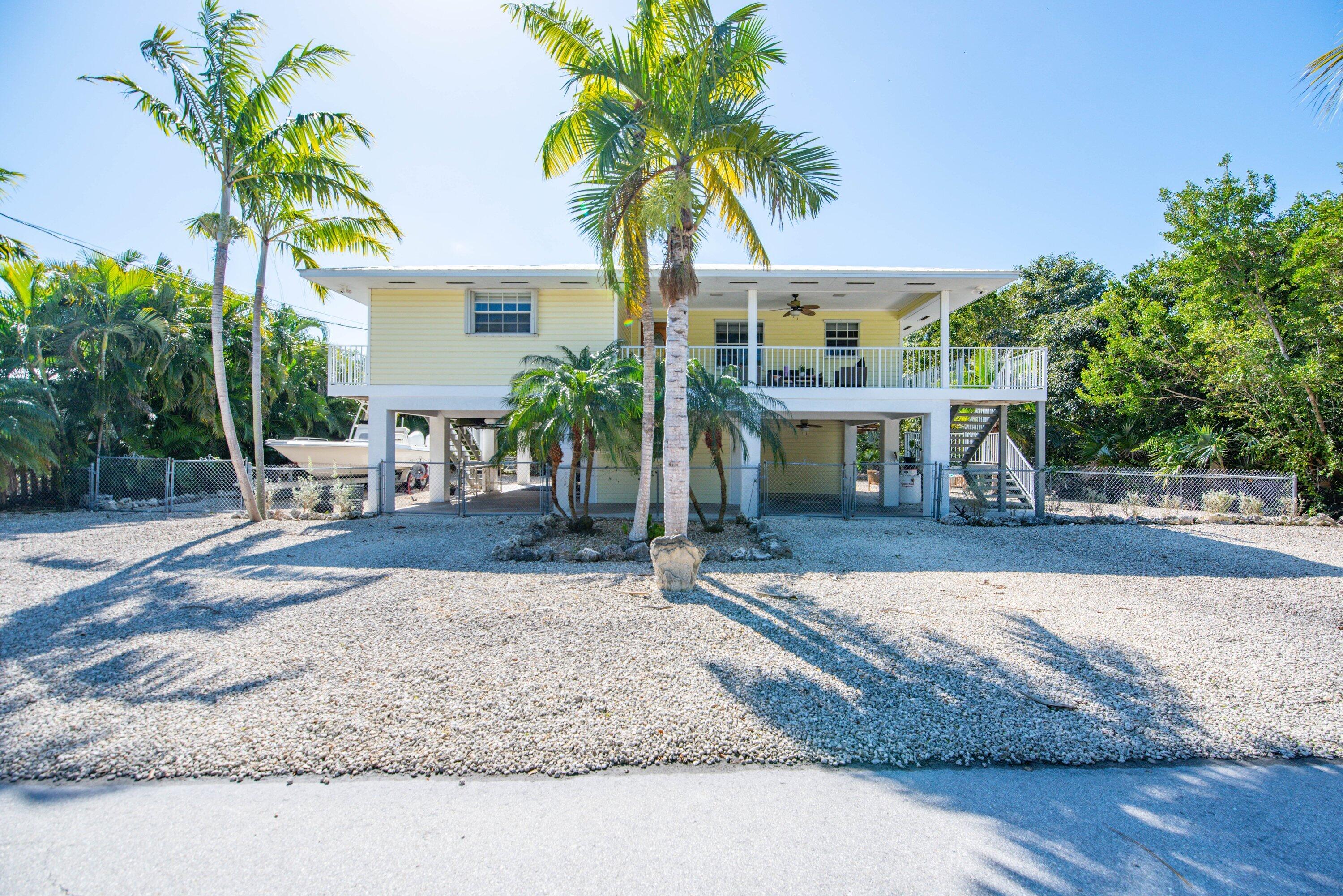 29160 Primrose Lane Big Pine Key, FL 33043 - Photo 29 of 37 a front view of a house with garden and porch