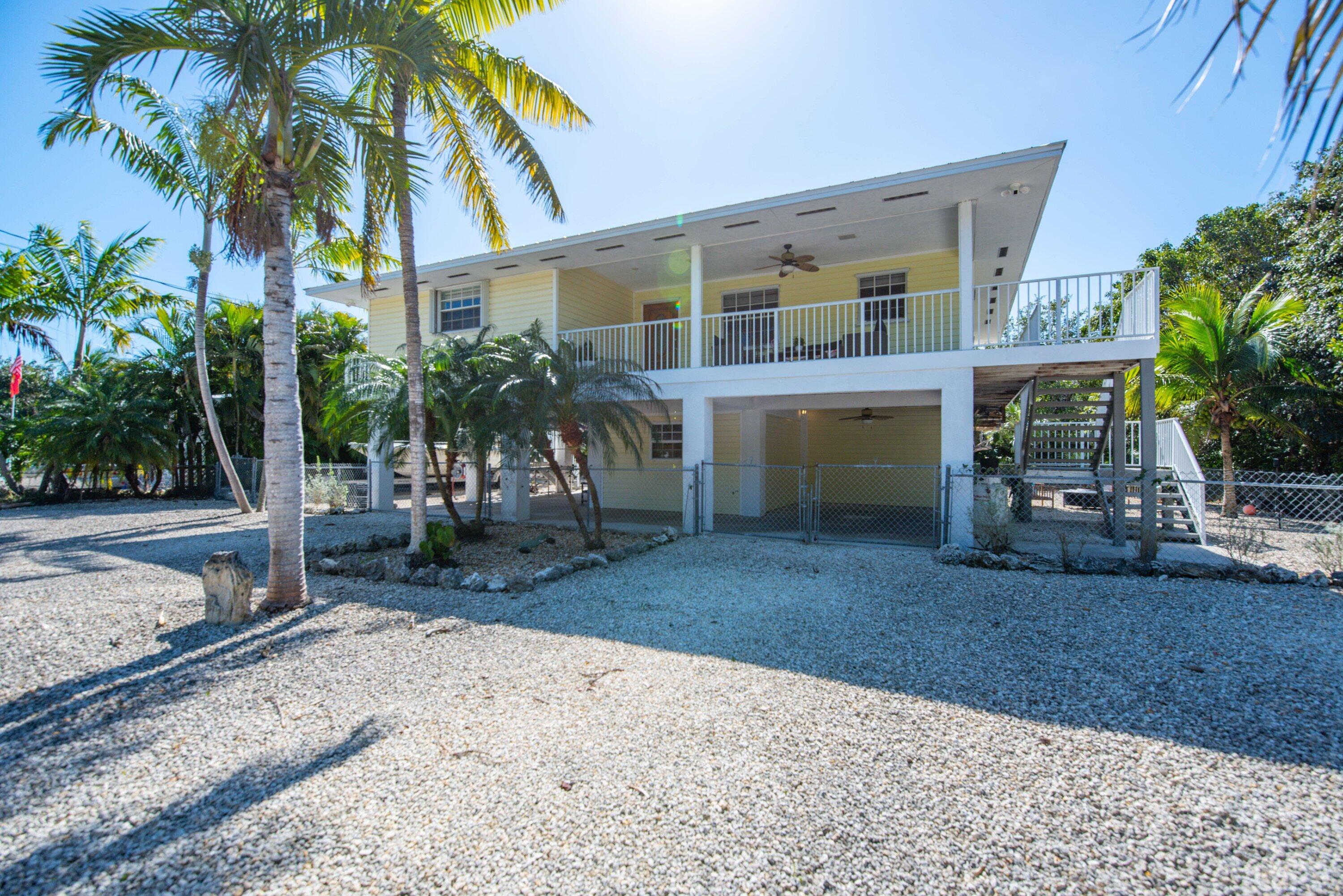 29160 Primrose Lane Big Pine Key, FL 33043 - Photo 30 of 37 a view of a house with a patio