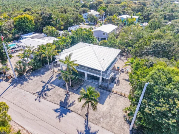 a view of a yard with an outdoor space