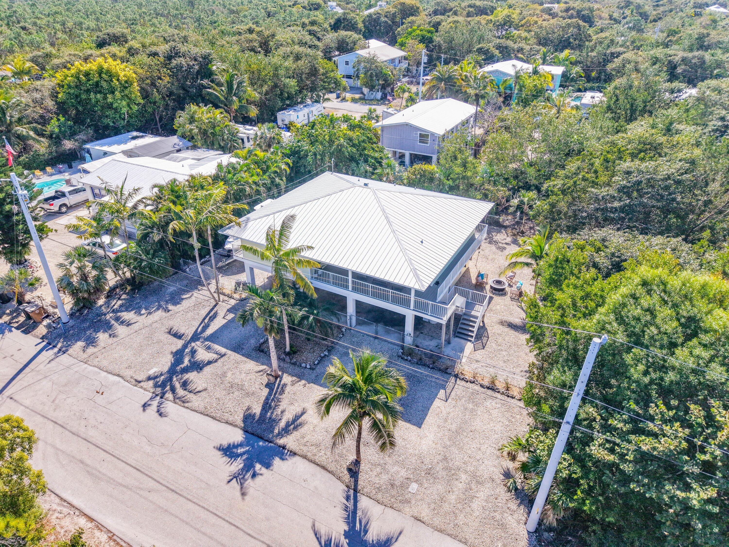 29160 Primrose Lane Big Pine Key, FL 33043 - Photo 31 of 37 an aerial view of residential house with outdoor space and swimming pool