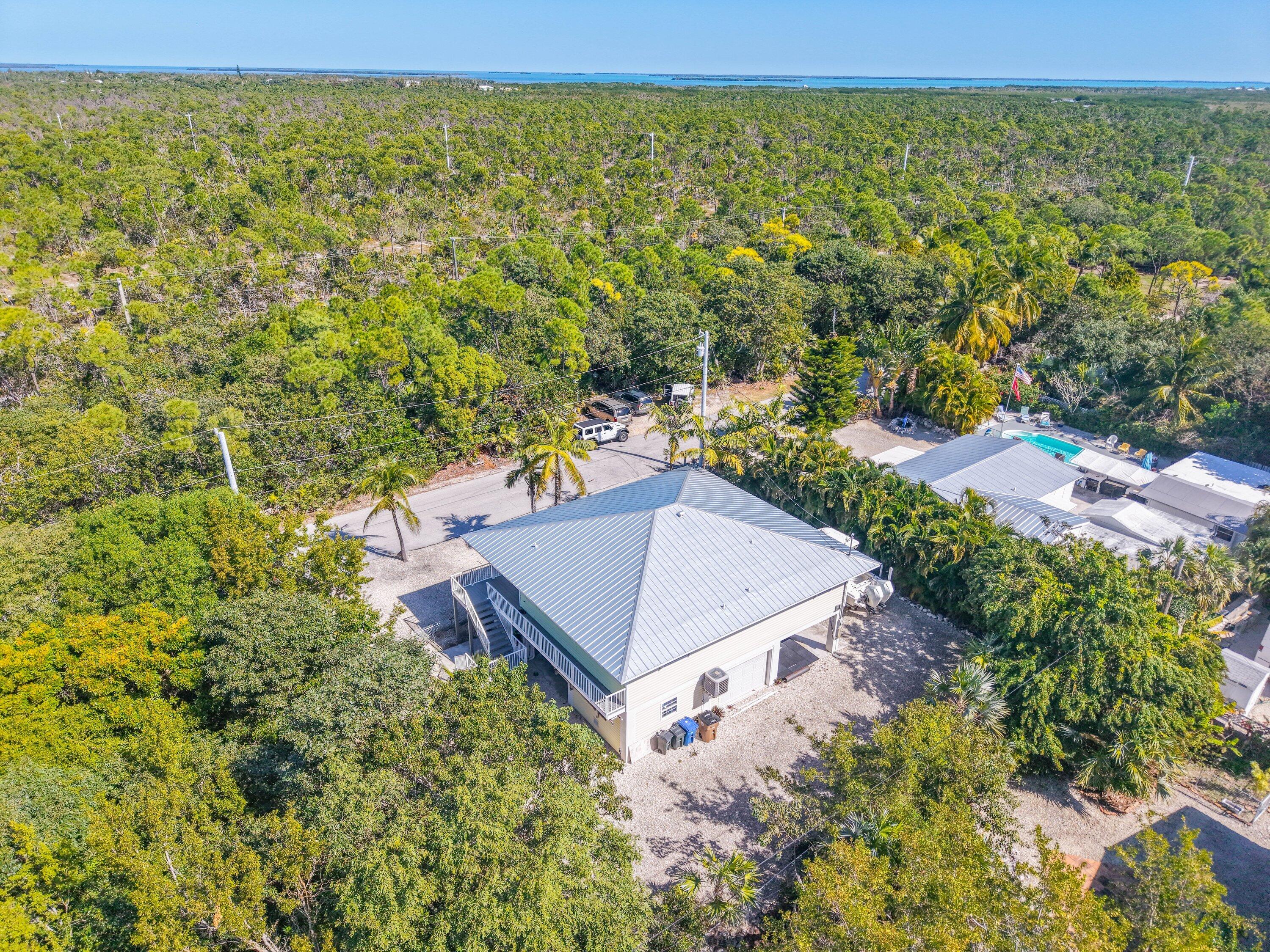 29160 Primrose Lane Big Pine Key, FL 33043 - Photo 32 of 37 a view of a yard with an outdoor space