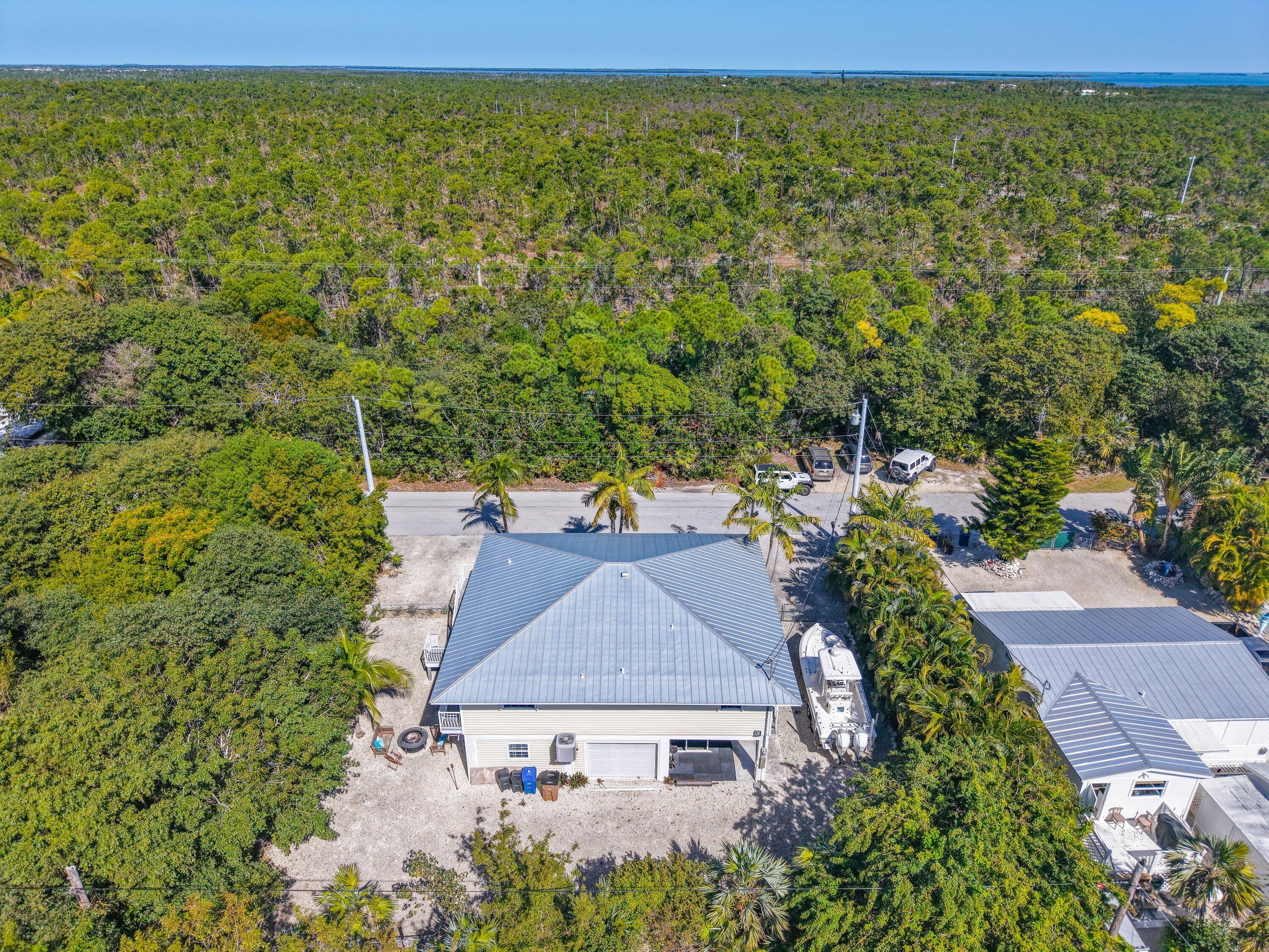 29160 Primrose Lane Big Pine Key, FL 33043 - Photo 33 of 37 a aerial view of a house with a yard