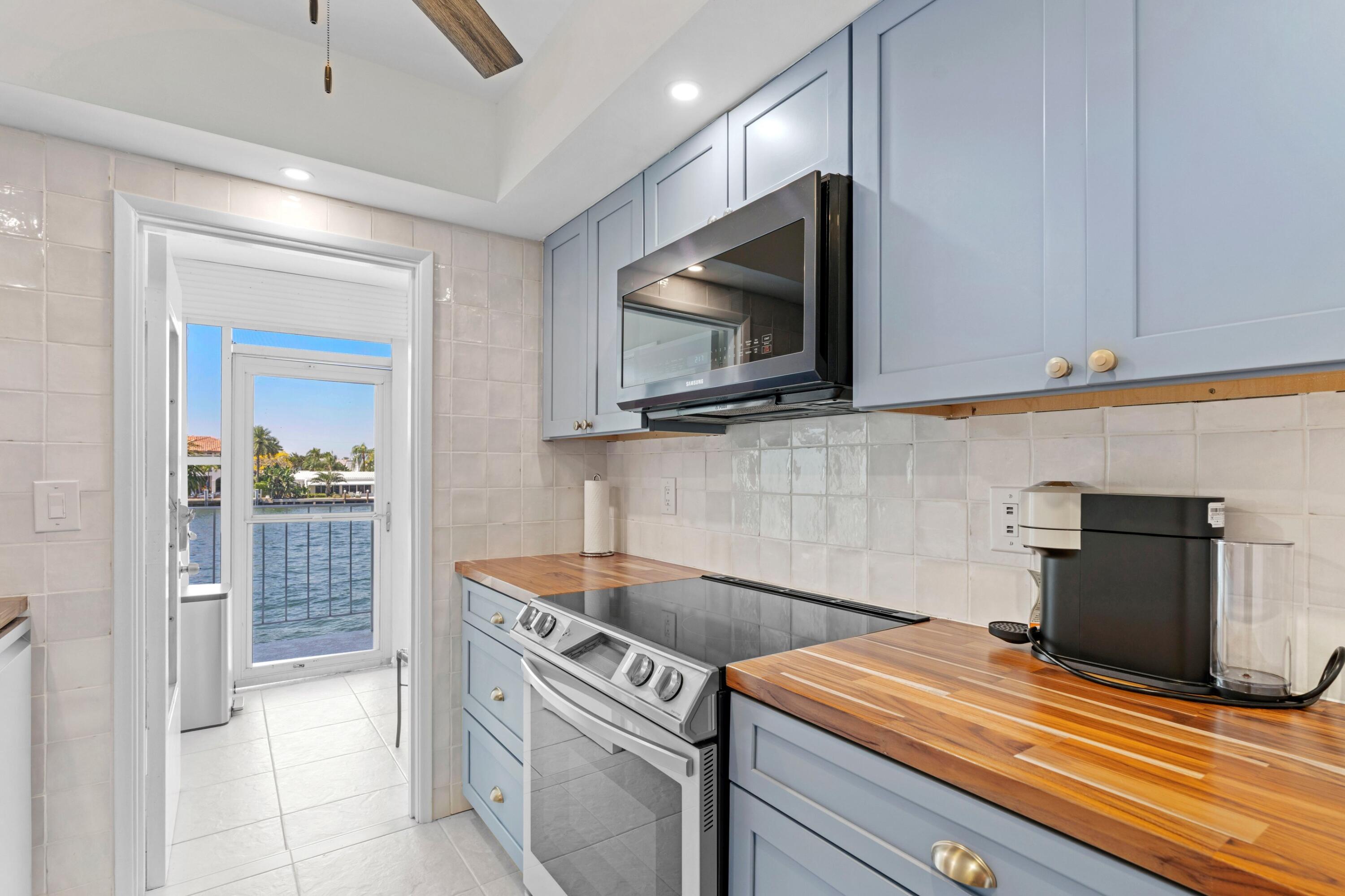 801 North Riverside Drive, Unit 7B Pompano Beach, FL 33062 - Photo 5 of 35 Kitchen