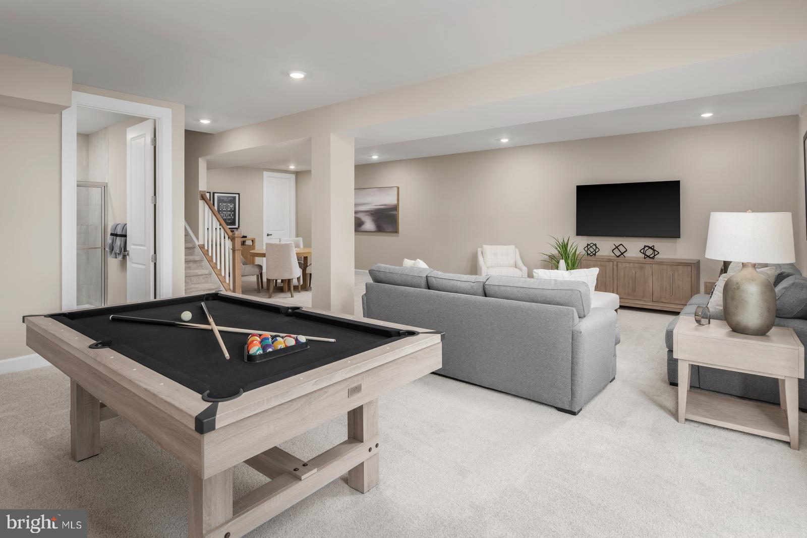 3187 Leopold Court Huntingdon Valley, PA 19006 - Photo 22 of 27 a living room with furniture and a flat screen tv