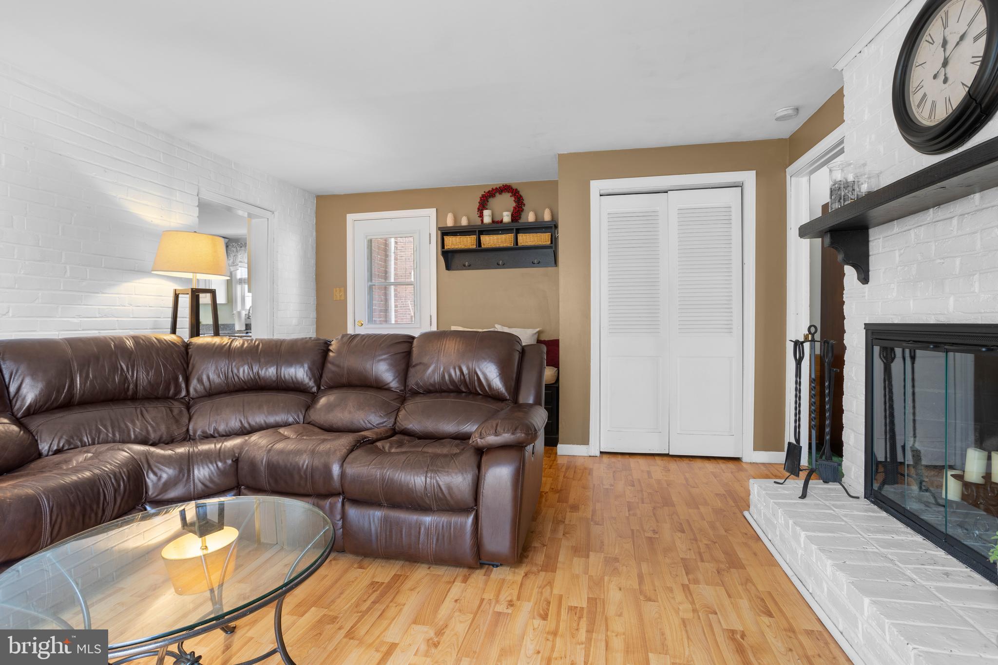 351 Shaw Road Ridley Park, PA 19078 - Photo 11 of 33 a living room with furniture and a wooden floor