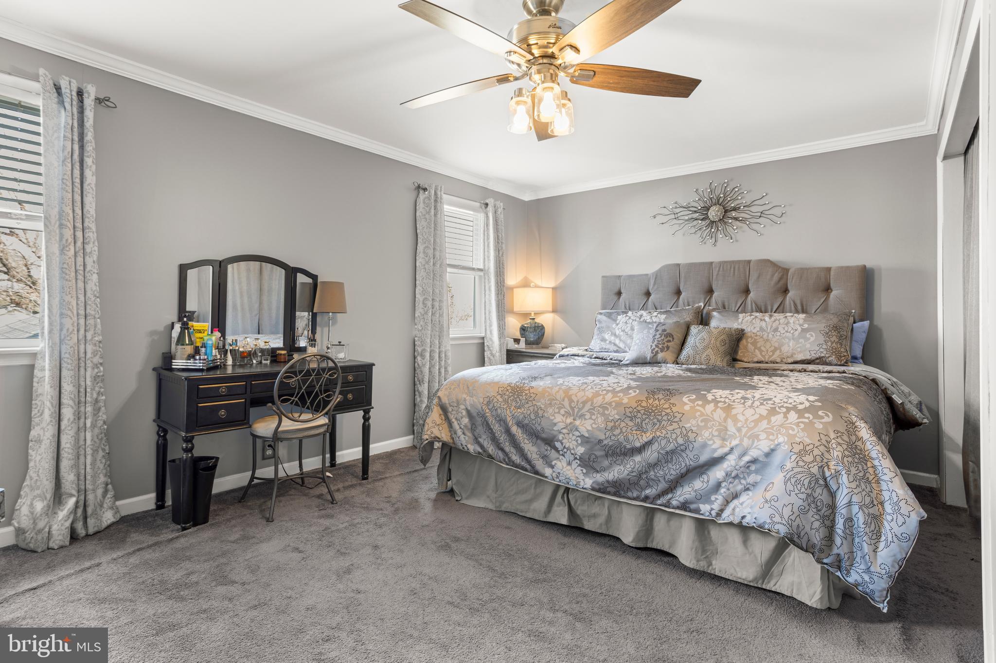 351 Shaw Road Ridley Park, PA 19078 - Photo 18 of 33 a bedroom with a bed and a chandelier