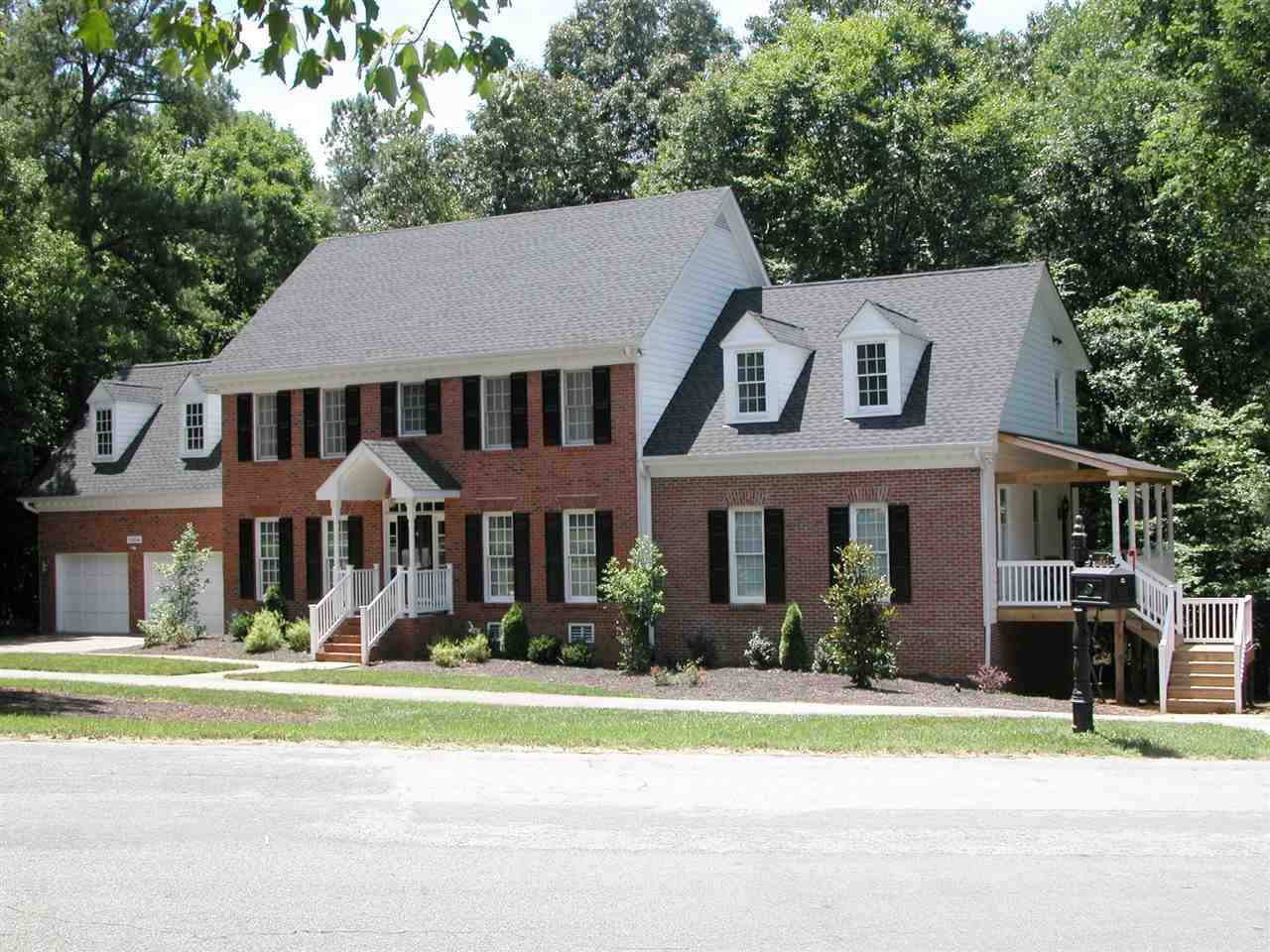 11604 Chipaway Court Raleigh, NC 27614 - Photo 1 of 25 Front View - Circular driveway, 2 car garage, separate mother-in-law suite entrance nestled on a wooded lot. Exterior Front