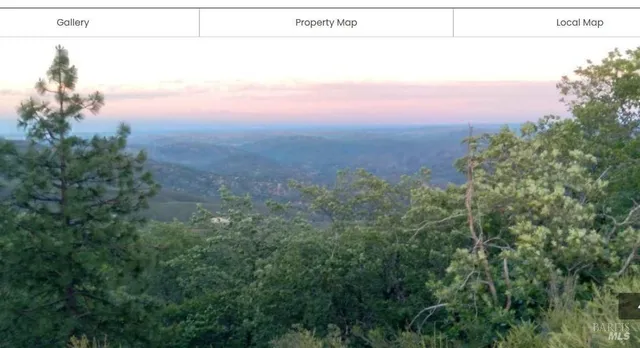 a view of a swimming pool with an outdoor space