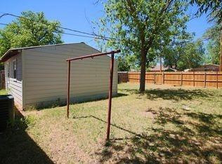 1910 16th Street Lubbock, TX 79401 - Photo 19 of 21 a backyard of a house