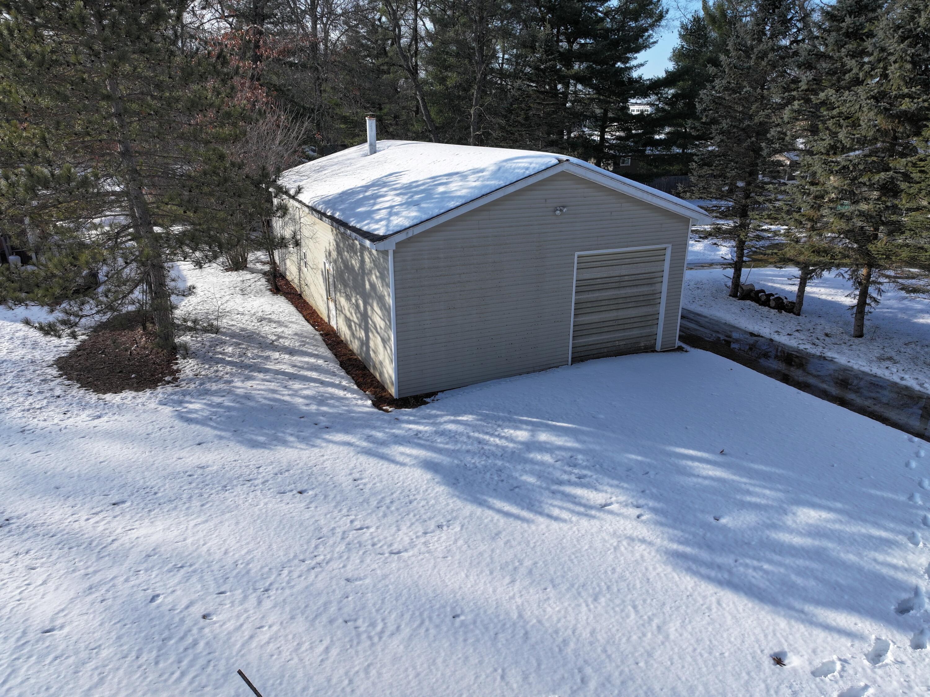 4248 Stutzman Street Brethren, MI 49619 - Photo 12 of 73 DJI_20260216162242_0323_D