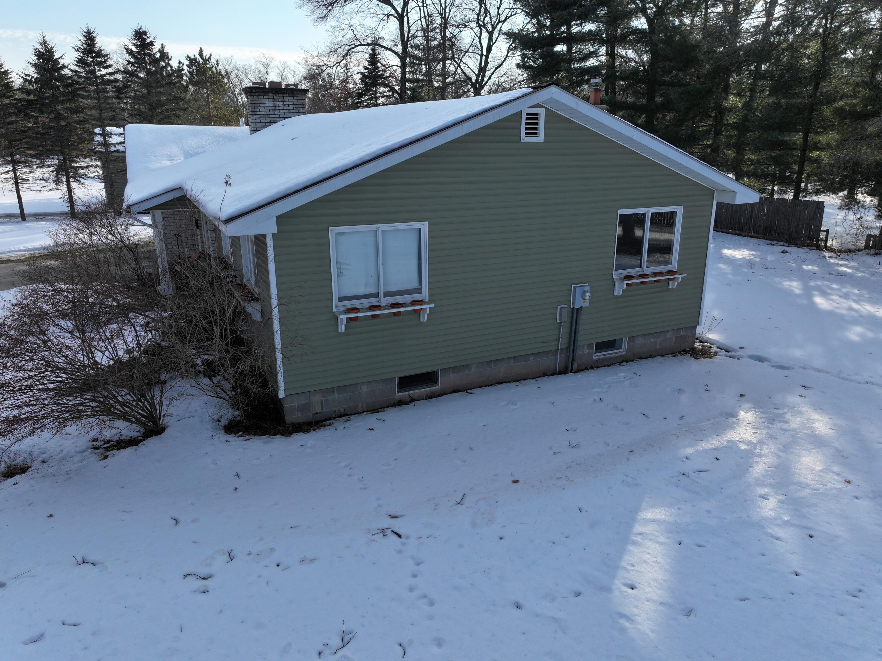 4248 Stutzman Street Brethren, MI 49619 - Photo 7 of 73 DJI_20260216162507_0330_D